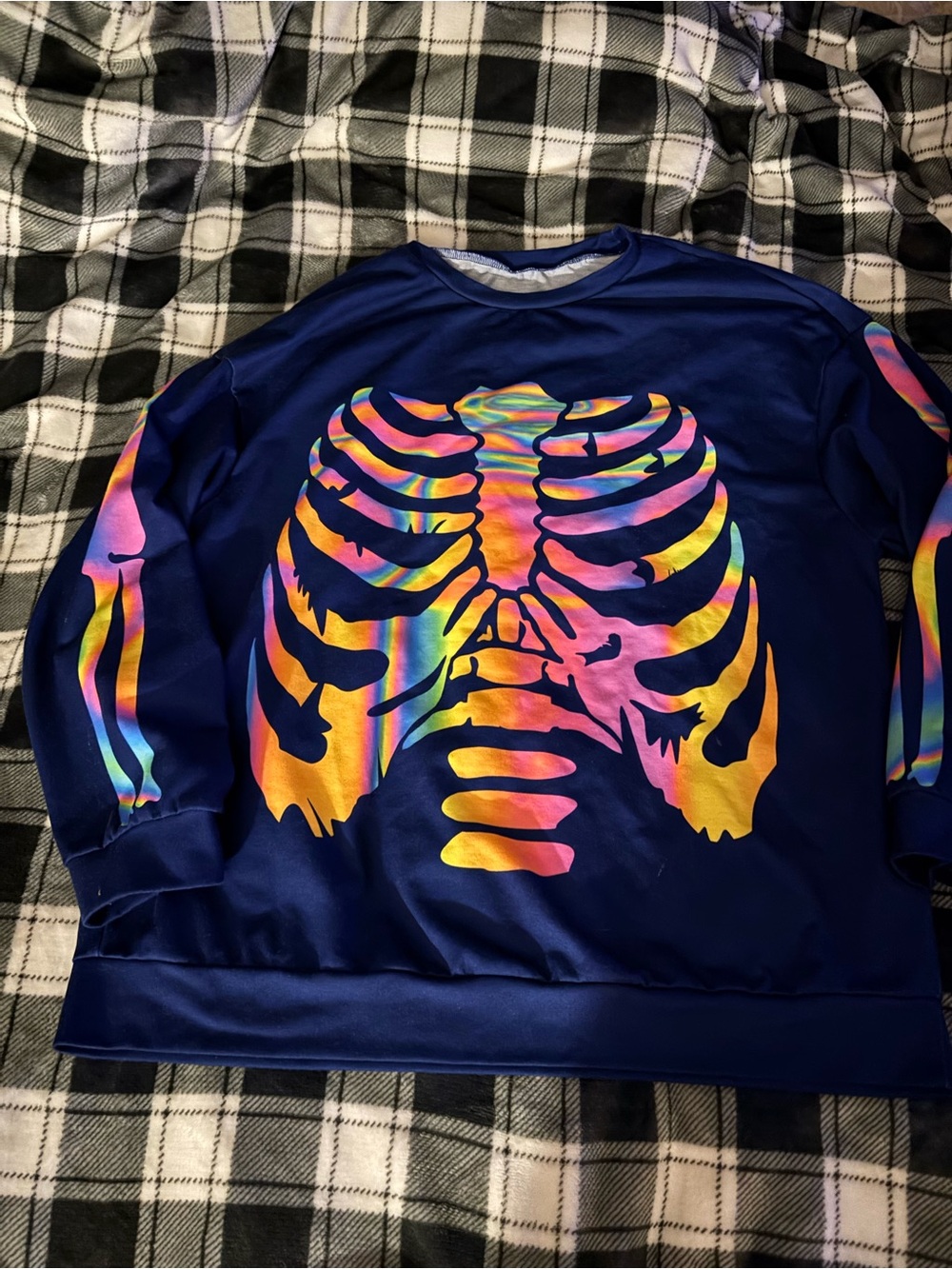 SHEIN nwot skeleton in vivid colors on a dark navy blue long sleeve.